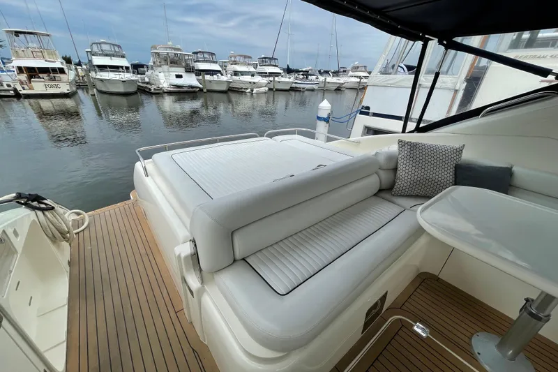 Cover Girl Yacht Photos Pics Luxurious 1997 Sunseeker Camargue 51 yacht interior with marina view.