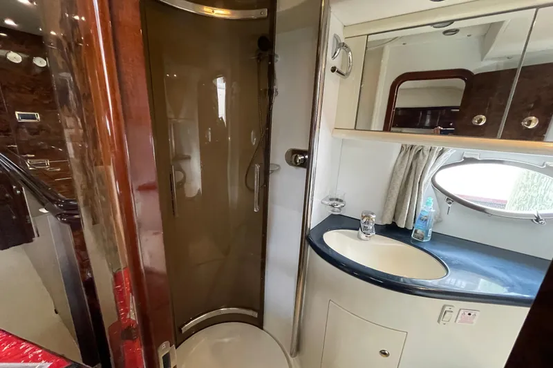 Cover Girl Yacht Photos Pics Bathroom interior of 1997 Sunseeker Camargue 51 yacht with shower and sink.