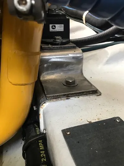 Hey Dad Yacht Photos Pics Engine compartment of 1999 Provincial 42 Fishing Boat, showing mechanical components and wiring.