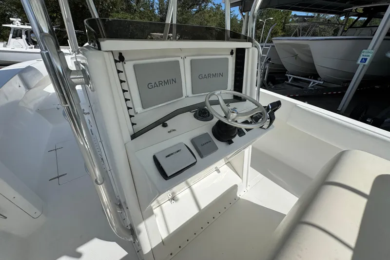  Yacht Photos Pics 2007 Venture 34 Open boat console with Garmin navigation and Mercury controls.