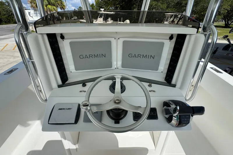  Yacht Photos Pics 2007 Venture 34 Open boat helm with dual Garmin displays and Mercury controls.