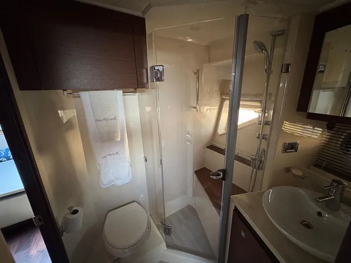  Yacht Photos Pics Luxurious bathroom in 2015 Sea Ray 510 Sundancer yacht with modern fixtures and shower.