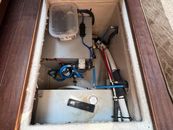  Yacht Photos Pics Engine compartment of a 2015 Sea Ray 510 Sundancer with visible wiring and components.