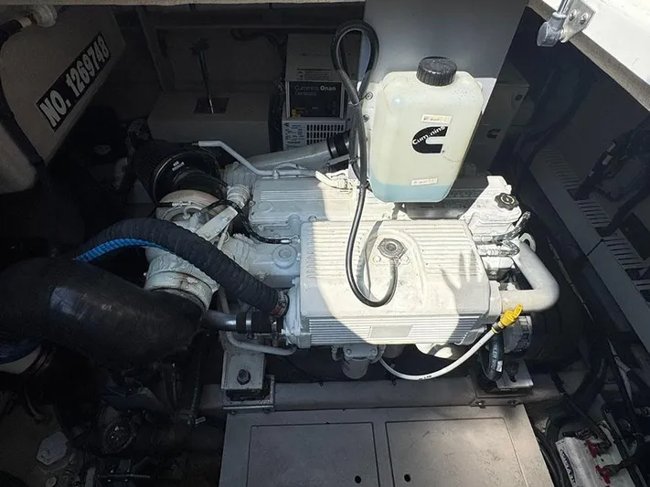  Yacht Photos Pics Engine compartment of a 2015 Sea Ray 510 Sundancer boat, featuring mechanical components.