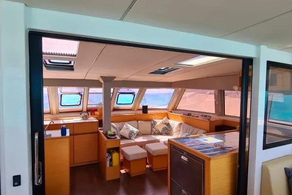 Kaikira Yacht Photos Pics Interior of 2019 Nautitech 46 catamaran with spacious seating and panoramic windows.