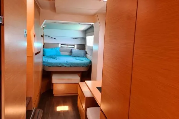 Kaikira Yacht Photos Pics Interior of 2019 Nautitech 46 catamaran with cozy cabin and modern wood finish.