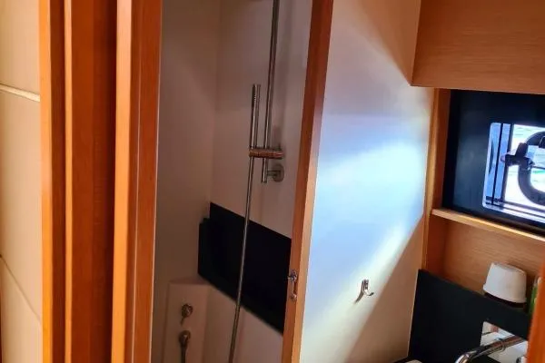 Kaikira Yacht Photos Pics Interior of 2019 Nautitech 46 yacht bathroom with shower and window.