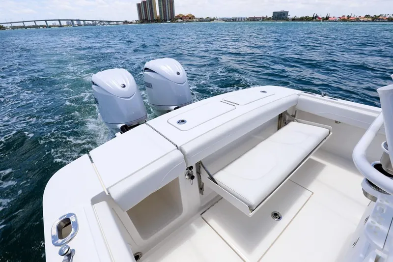  Yacht Photos Pics 2024 Regulator 23 boat with dual engines on open water.