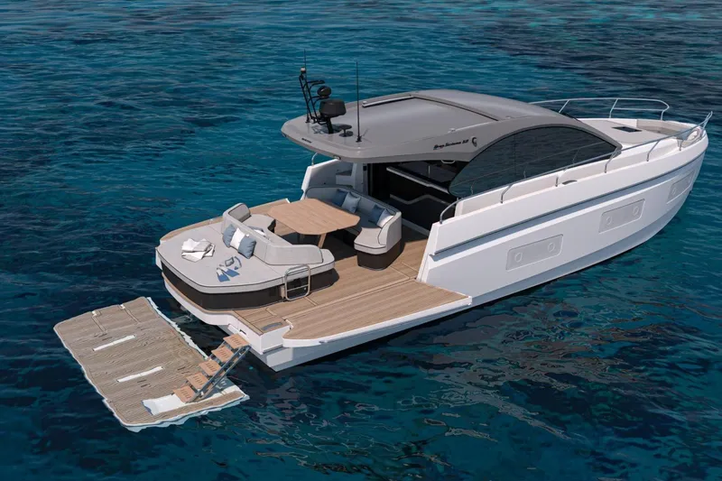  Yacht Photos Pics 2026 Beneteau Gran Turismo 50 yacht on serene blue waters, featuring a spacious deck.