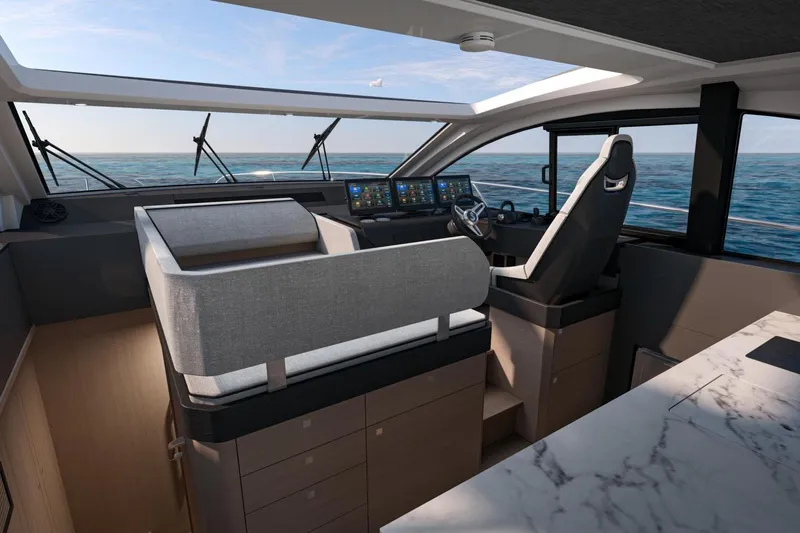  Yacht Photos Pics Interior of 2026 Beneteau Gran Turismo 50 yacht with modern helm and ocean view.