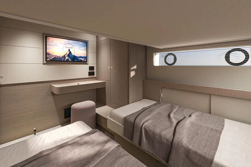  Yacht Photos Pics Luxurious cabin interior of 2026 Beneteau Gran Turismo 50 yacht with modern amenities.