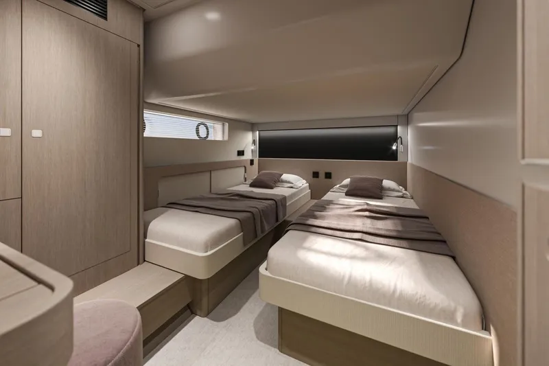  Yacht Photos Pics Luxurious twin cabin interior of 2026 Beneteau Gran Turismo 50 yacht.