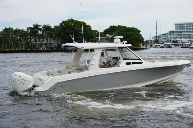 Iboat 3 Yacht Photos Pics 2019 Boston Whaler 350 Realm cruising on a scenic waterway.