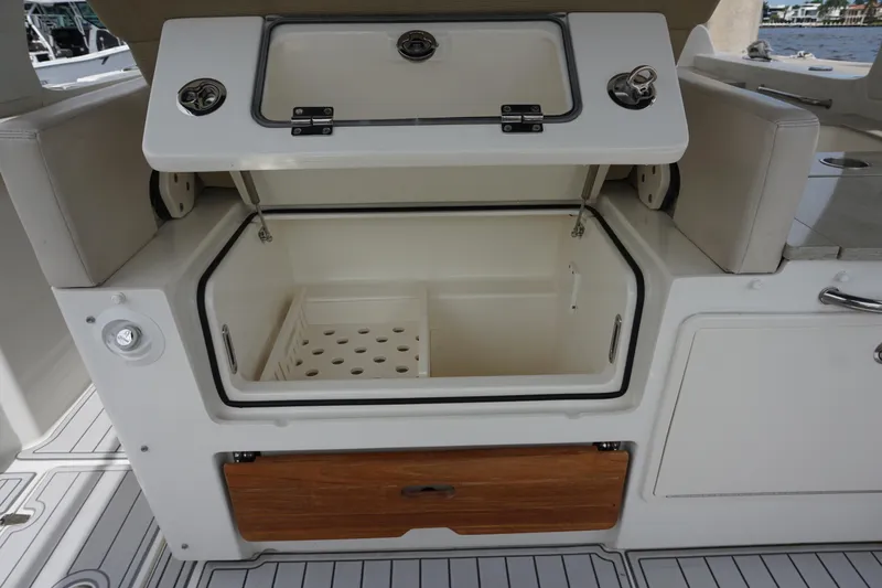 Iboat 3 Yacht Photos Pics Open storage compartment on 2019 Boston Whaler 350 Realm boat.