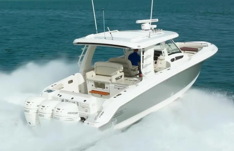 Iboat 3 Yacht Photos Pics 2019 Boston Whaler 350 Realm cruising on open water.