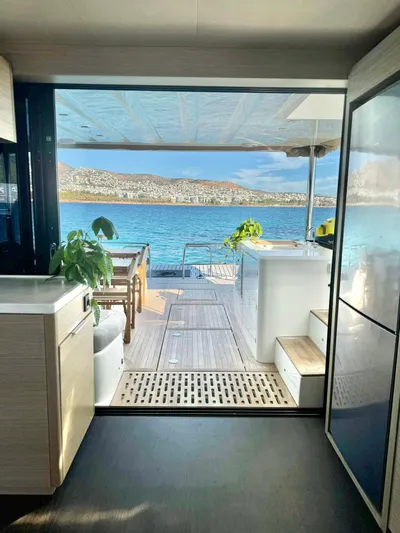 Esperance Yacht Photos Pics Luxurious interior of 2024 Lagoon 55 yacht with stunning ocean view.