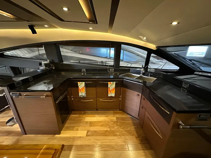 Flawless Yacht Photos Pics Luxurious kitchen interior of 2015 Sea Ray L650 Fly yacht with modern design.