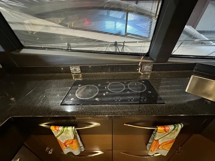 Flawless Yacht Photos Pics Modern kitchen in 2015 Sea Ray L650 Fly yacht with sleek stovetop.