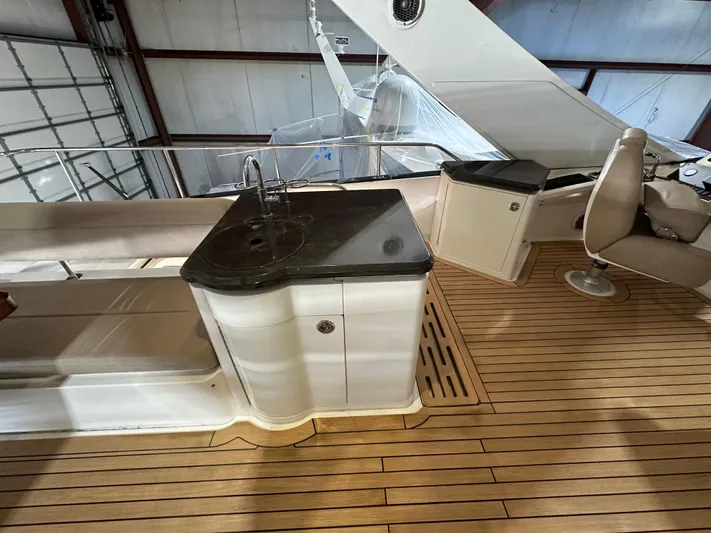 Flawless Yacht Photos Pics 2015 Sea Ray L650 Fly yacht interior with teak flooring and sleek countertop.