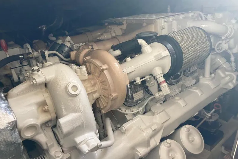  Yacht Photos Pics Engine of a 2004 Ferretti Yachts 590, showcasing intricate mechanical components.