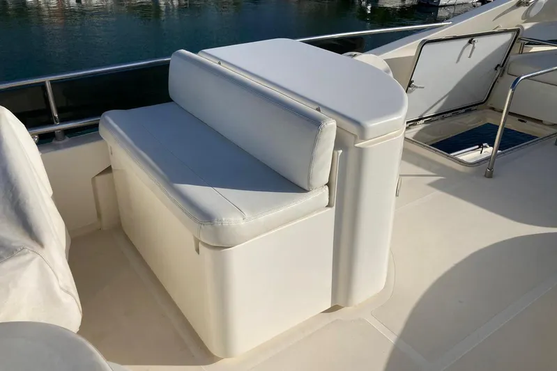  Yacht Photos Pics 2004 Ferretti Yachts 590 seating area on deck with water view.