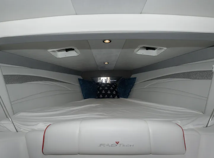  Yacht Photos Pics Interior cabin of 2017 Formula 382 FASTech boat, featuring sleek white design and ambient lighting.