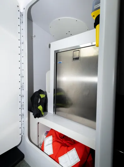  Yacht Photos Pics Interior of 2017 Formula 382 FASTech boat, featuring storage compartment and safety equipment.