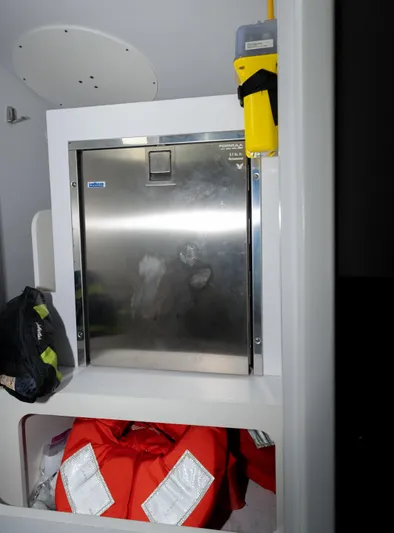  Yacht Photos Pics 2017 Formula 382 FASTech interior with storage compartment and safety equipment.