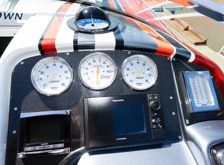  Yacht Photos Pics Dashboard of a 2017 Formula 382 FASTech boat with gauges and navigation system.