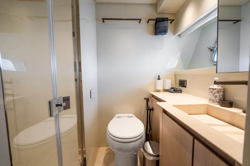  Yacht Photos Pics Bathroom interior of 2021 Sanlorenzo SX76 yacht, featuring modern fixtures and elegant design.