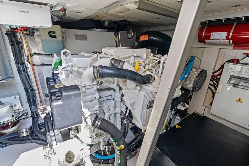 Roma Yacht Photos Pics Engine room of 2021 Azimut Magellano 43 yacht, showcasing mechanical components and systems.