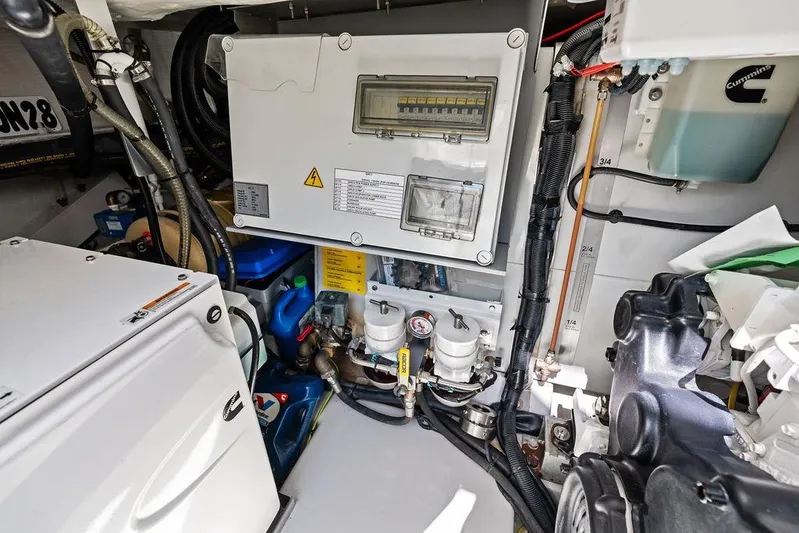 Roma Yacht Photos Pics Engine room of 2021 Azimut Magellano 43 yacht, showcasing electrical and mechanical components.