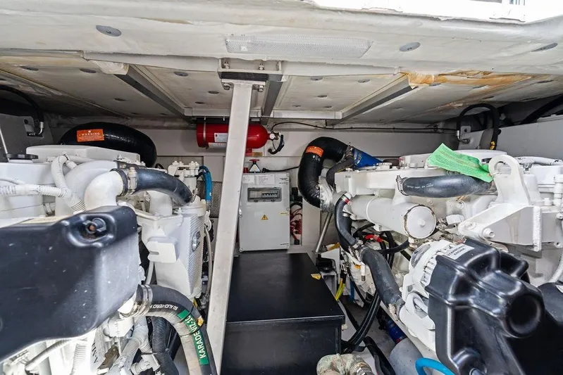 Roma Yacht Photos Pics Engine room of 2021 Azimut Magellano 43 yacht, showcasing dual engines and equipment.