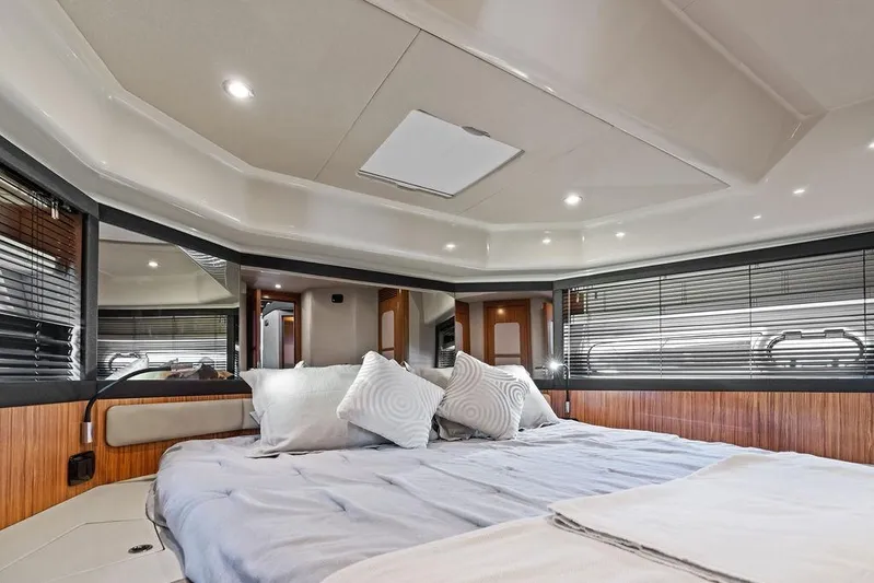 Roma Yacht Photos Pics Luxurious bedroom interior of 2021 Azimut Magellano 43 yacht with modern design.