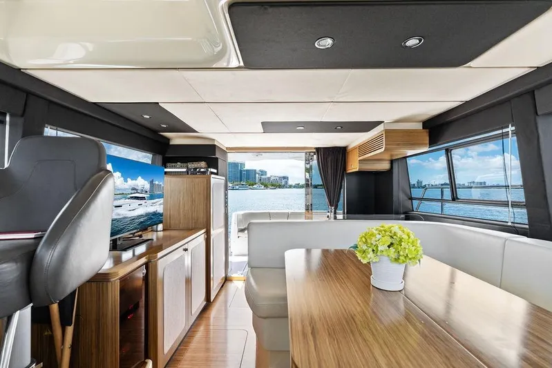 Roma Yacht Photos Pics Luxurious interior of 2021 Azimut Magellano 43 yacht with scenic water views.