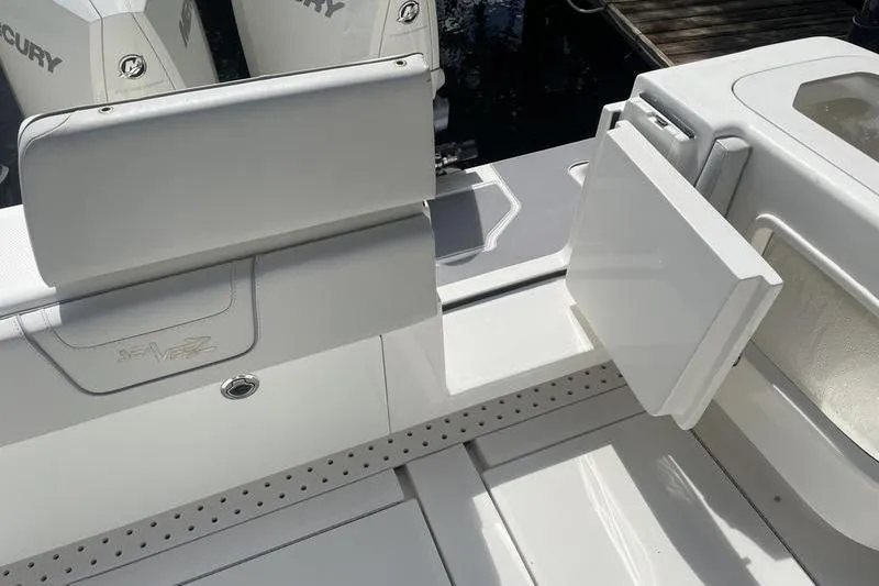  Yacht Photos Pics 2022 SeaVee 370z boat deck with Mercury engines and seating area.