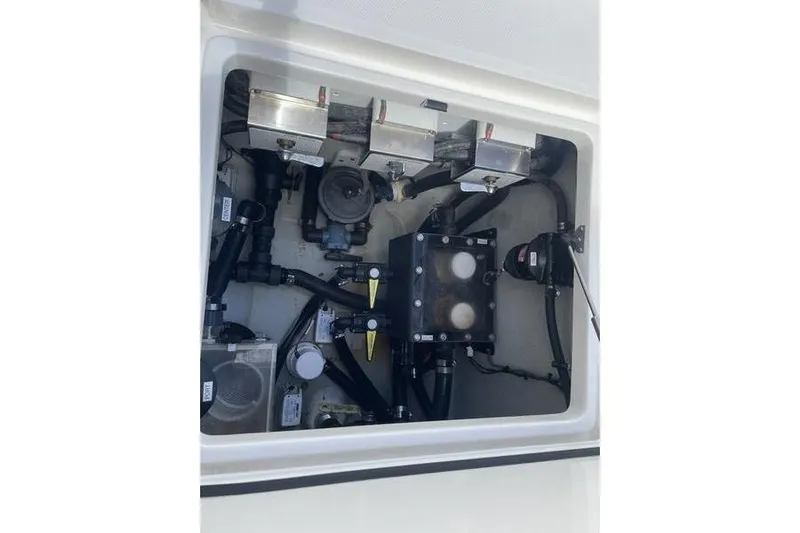  Yacht Photos Pics 2022 SeaVee 370z boat compartment showcasing complex mechanical components and systems.