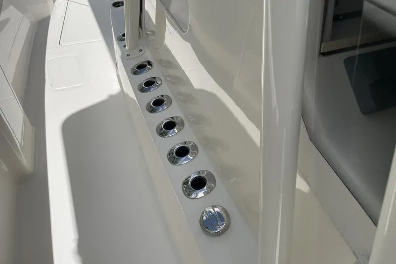  Yacht Photos Pics 2022 SeaVee 370z boat interior with multiple stainless steel cup holders.