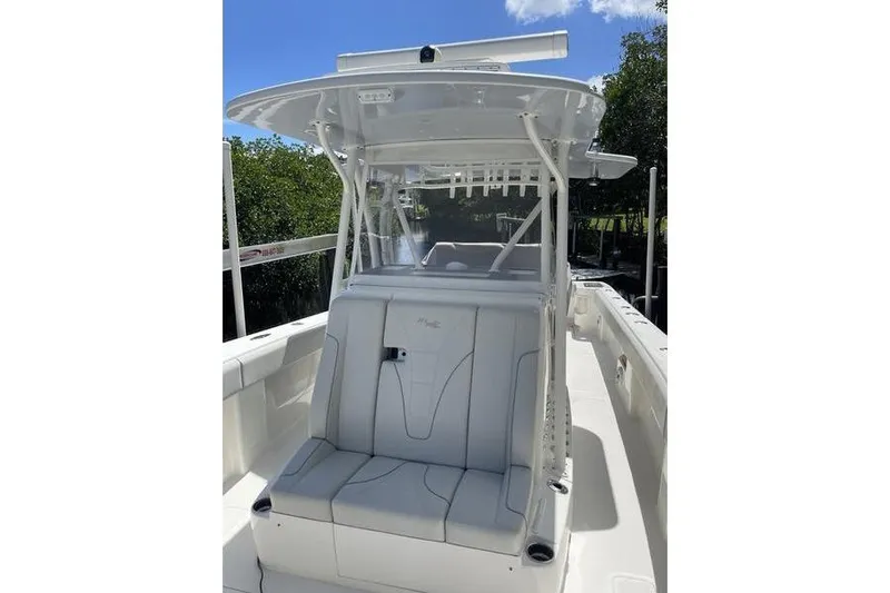  Yacht Photos Pics 2022 SeaVee 370z boat with sleek seating and modern design under a clear blue sky.