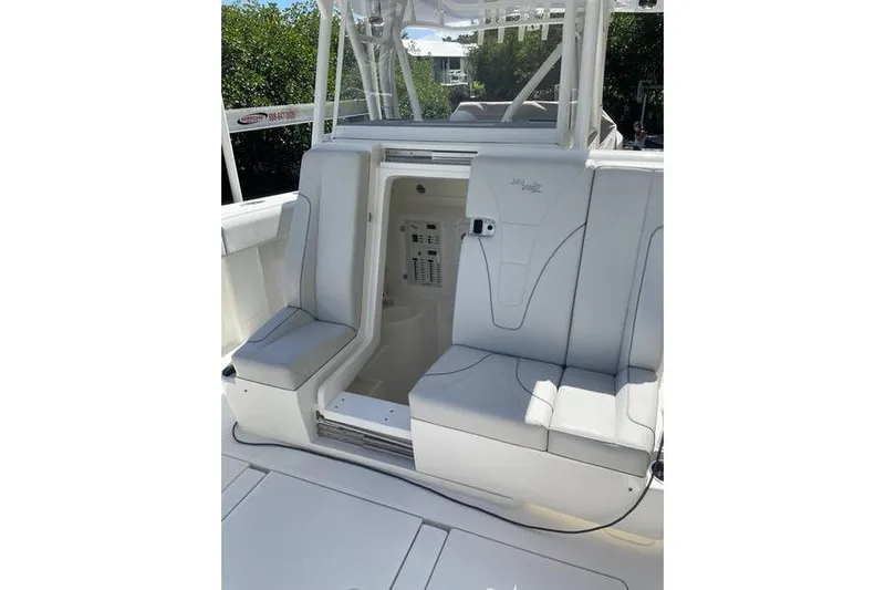  Yacht Photos Pics 2022 SeaVee 370z boat interior with seating and storage compartment.