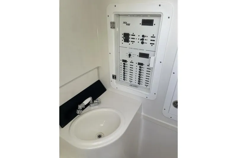  Yacht Photos Pics Control panel and sink in 2022 SeaVee 370z boat interior.