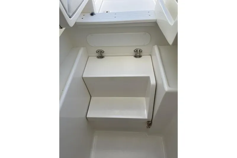  Yacht Photos Pics 2022 SeaVee 370z boat interior steps, featuring sleek white design and stainless steel fixtures.