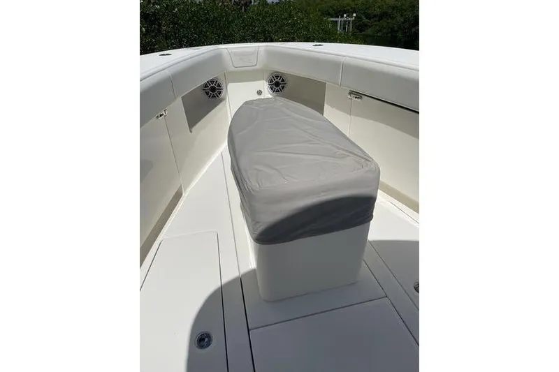  Yacht Photos Pics 2022 SeaVee 370z boat interior with covered seating and speakers.