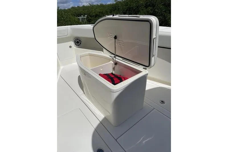  Yacht Photos Pics Open storage compartment on 2022 SeaVee 370z boat with red bag inside.