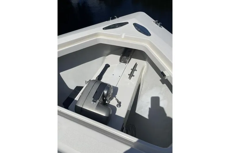  Yacht Photos Pics 2022 SeaVee 370z boat anchor compartment with winch and cleat.