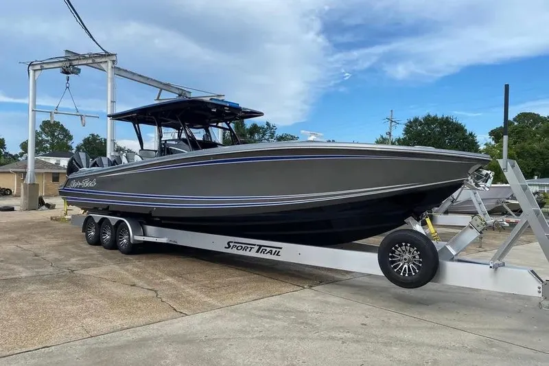  Yacht Photos Pics 2023 Nor-Tech 390 Sport Center Console boat on trailer, outdoor setting.
