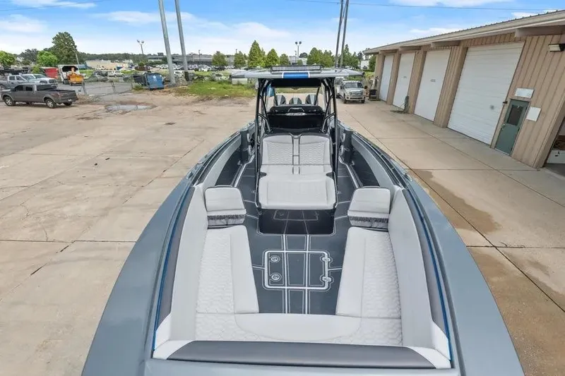  Yacht Photos Pics 2023 Nor-Tech 390 Sport Center Console boat with sleek seating and modern design.