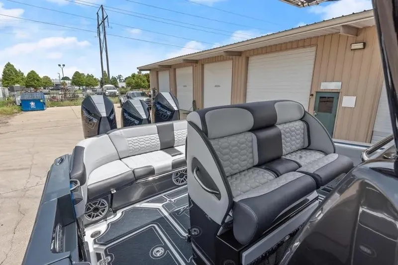  Yacht Photos Pics 2023 Nor-Tech 390 Sport Center Console boat with luxurious seating and powerful engines.