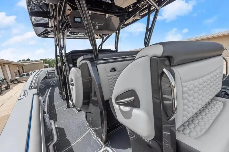 Yacht Photos Pics 2023 Nor-Tech 390 Sport Center Console interior with sleek seating and modern design.