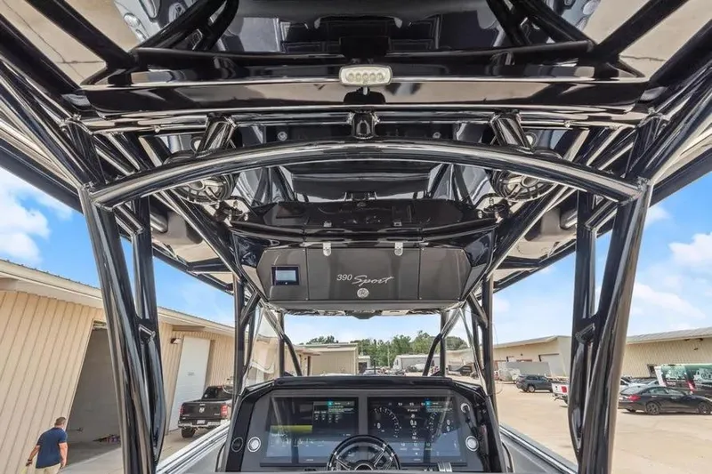  Yacht Photos Pics 2023 Nor-Tech 390 Sport Center Console interior with advanced navigation system and sleek design.